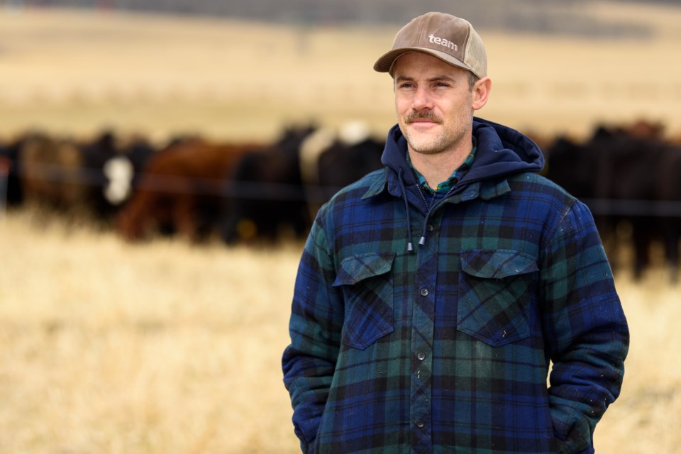 Ben Campbell, winner of the 2022 Outstanding Young Farmer Award for the NWT/Alberta region, in the field on 1500 acre Tullichewan Ranch he operates with his family north of Black Diamond on April 27. 