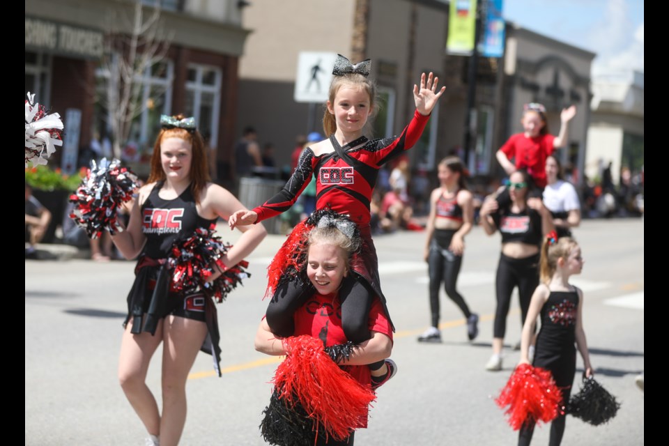 Members of Champion Dance and Cheerleading take part in the Okotoks Parade on June 18.