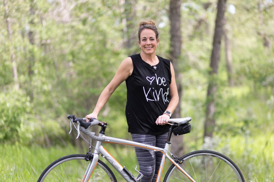 Delanie Cerkvenac, pictured with her bike on July 7, will be taking part in her first Enbridge Tour Alberta for Cancer (formerly Ride to Conquer Cancer) on July 23-24. Cerkvenac was motivated by friends participating in the past and was diagnosed a year ago with lung cancer.
