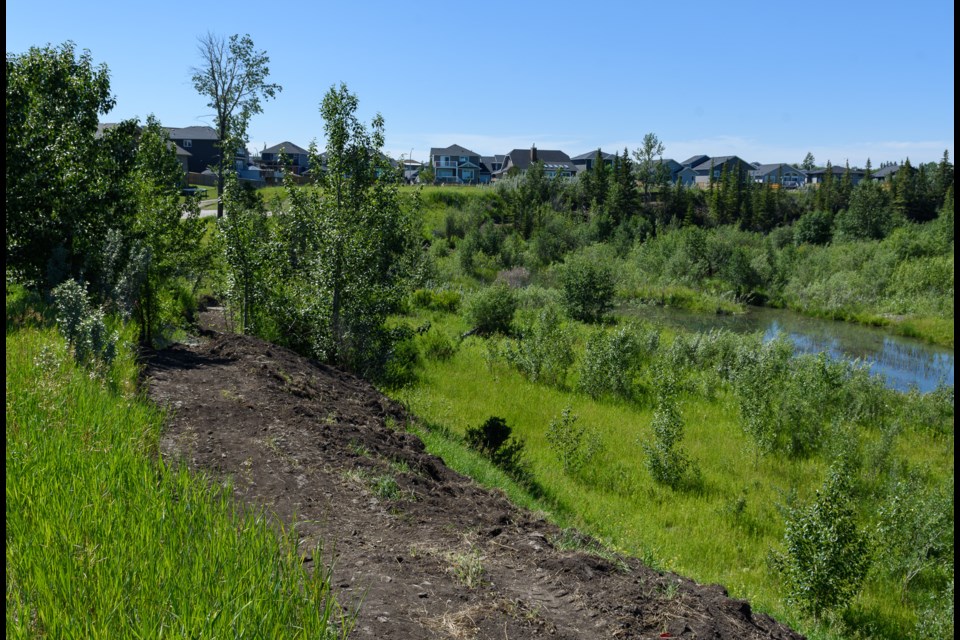 Part of a mountain bike track under construction in Black Diamond on July 15. The track is being built for the 2023 Alberta Summer Games, and this portion of the track is on an escarpment behind the pump track.