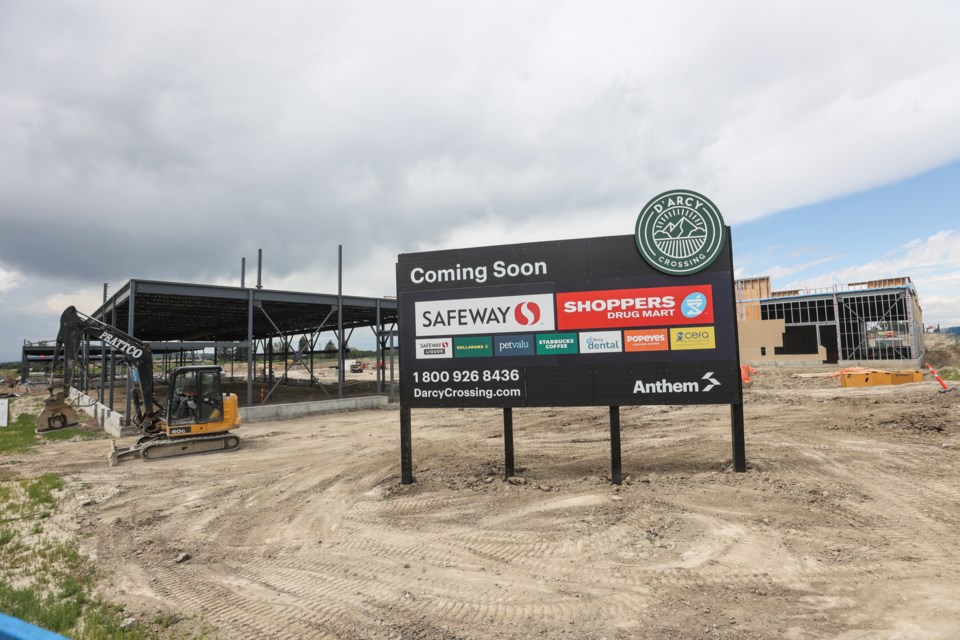 Framework takes shape in the commercial centre of the D'Arcy Ranch neighbourhood on July 22.