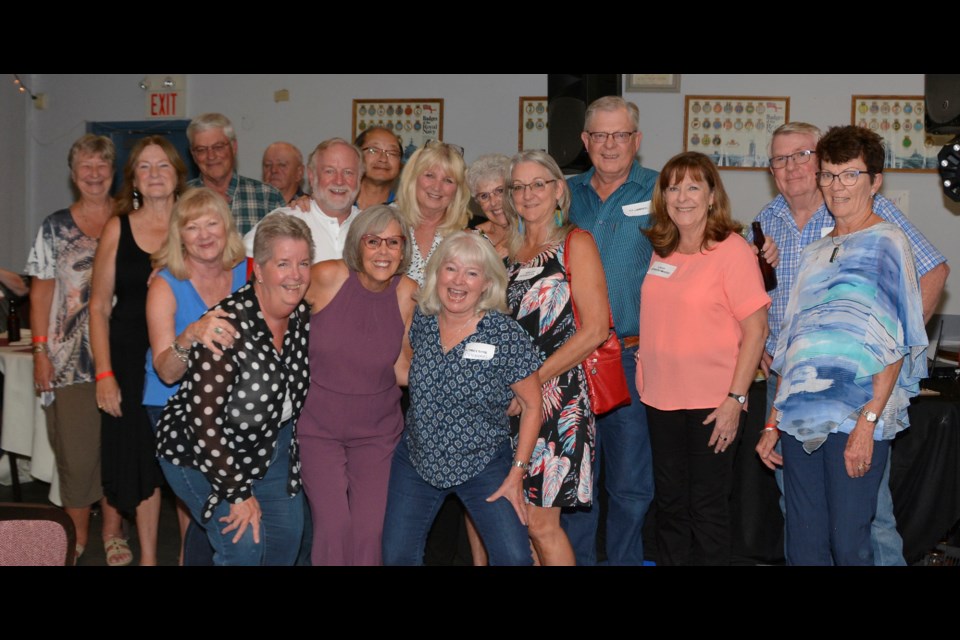 A group photo of some of the participants in the Diamond Valley Homecoming 2022 at the Turner Valley Legion on Sept. 10.