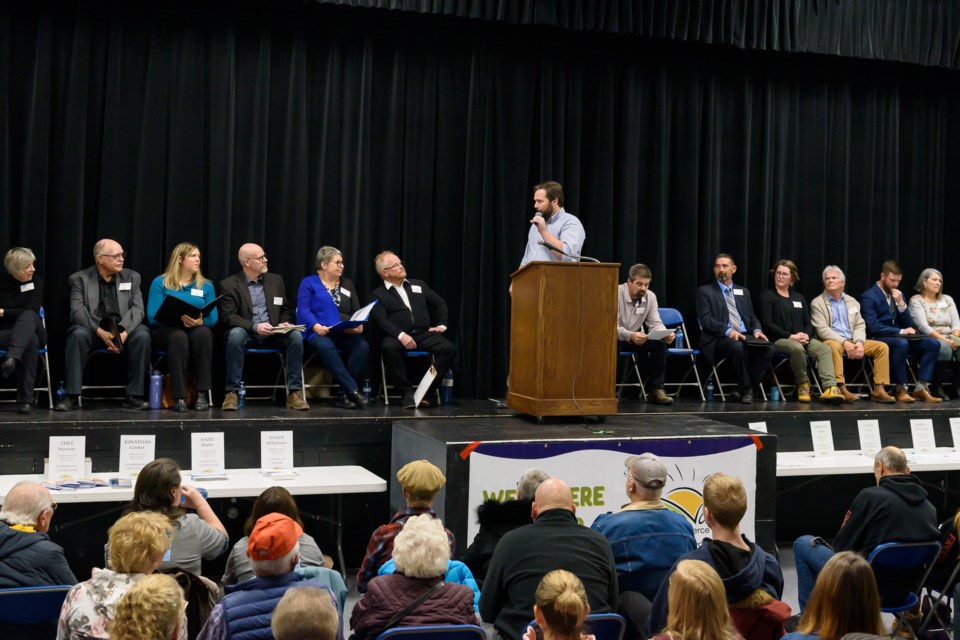 Moderator Jamie Wilkie speaks to election candidates during a forum at Oilfields High School in Black Diamond on Nov. 14.