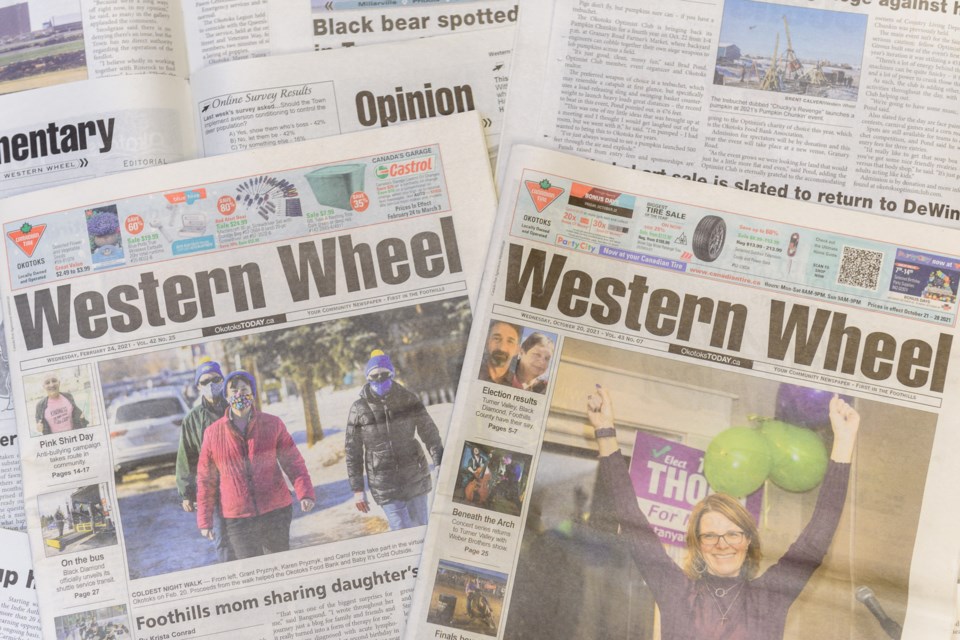 Copies of the Western Wheel at the Wheel's office in Okotoks. The Western Wheel submitted the Feb. 24 and Oct. 20, 2021 editions of the newspaper for judging, and received four 2021 Canadian Community Newspaper Awards from News Media Canada.