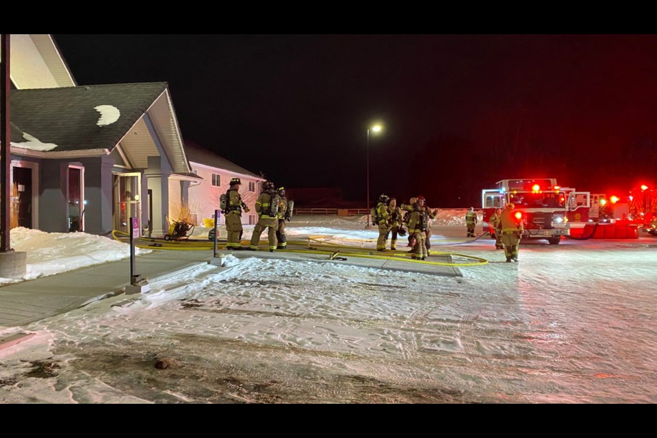 Okotoks firefighters battle a fire that damaged the north wing of the Okotoks Alliance Church on Feb. 5, 2023. The fire is alleged to be the result of arson and an investigation is underway. (Photo courtesy Tim Korthuis/Okotoks Alliance Church)