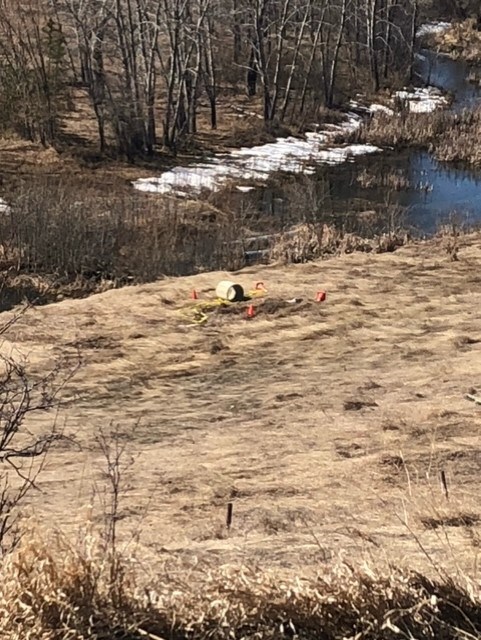 The location of the septic tank is cordoned off by cones and caution tape after man became trapped on April 16.