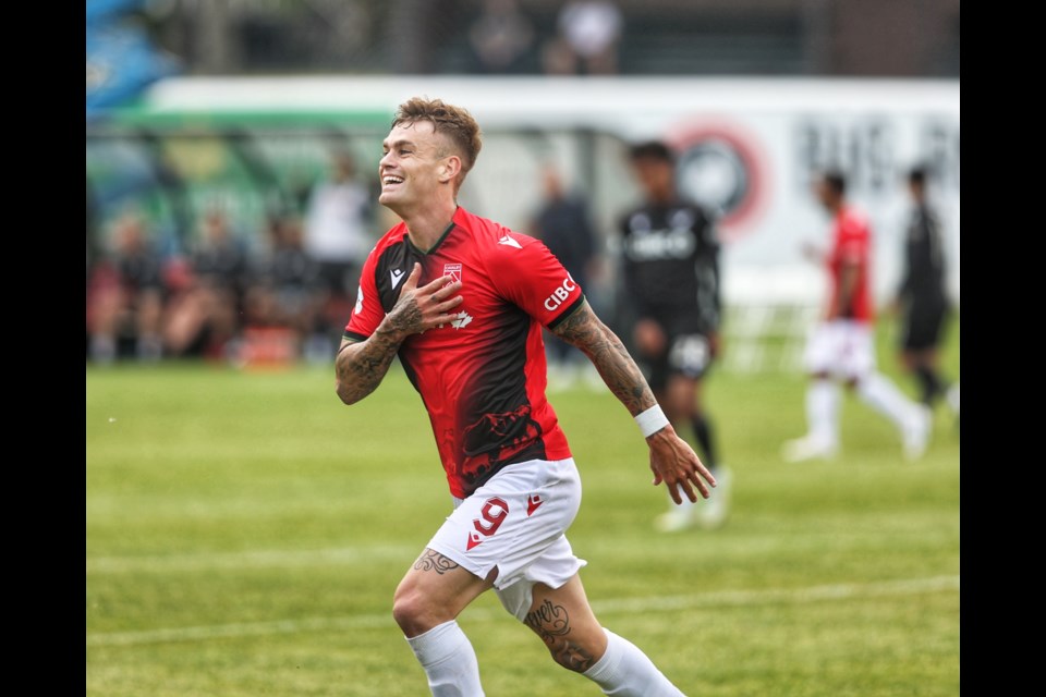 Cavalry FC striker Myer Bevan celebrates one of his two first half goals in the 3-1 win over Vancouver FC on Spruce Meadows' ATCO Field on June 11.