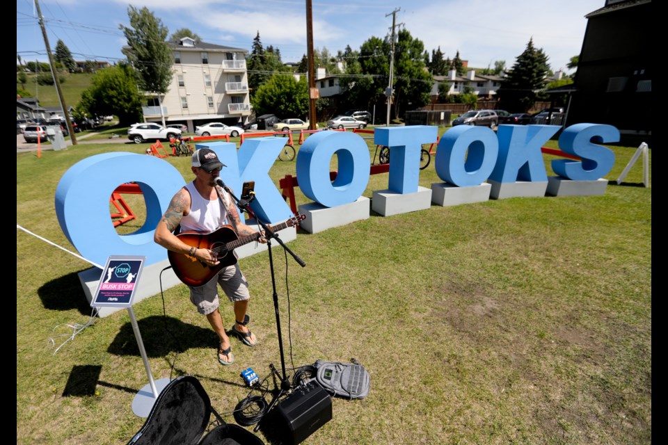 Michael Carson performs on the Landmark site during BuskersFest in downtown Okotoks on June 24.