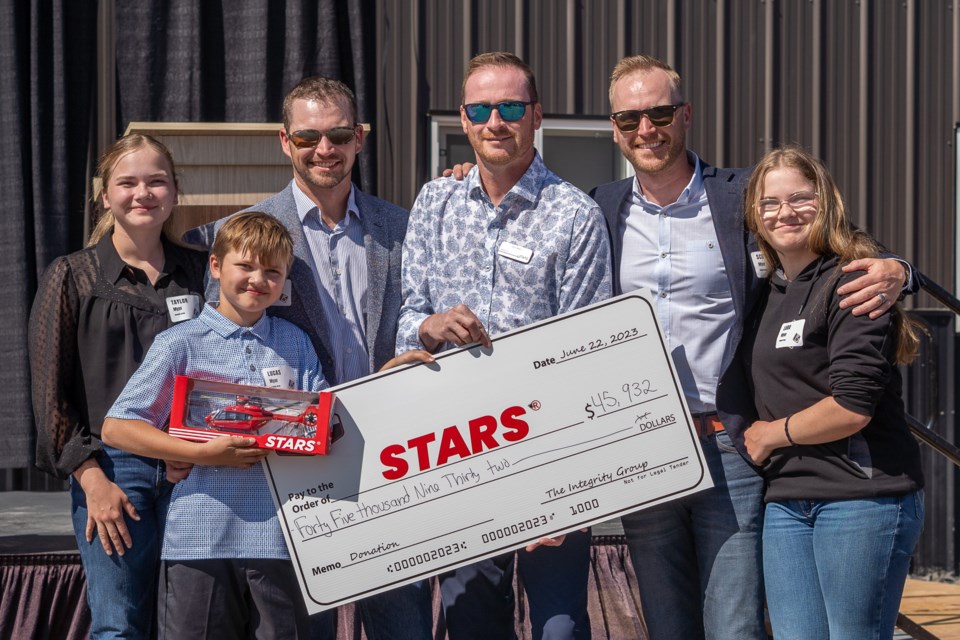 STARS provincial director Josh Nash (centre) accepts a cheque for almost $46,000 from Integrity Group CEO Jerry Myer and COO Scott Myer. Also pictured are Lucas, Lara and Taylor Myer.  