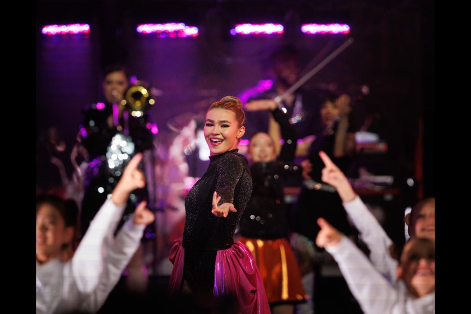 Okotoks Young Canadians performer Taylor Atkinson (center) performs in the Calgary Stampede's Grandstand Show on July 7.