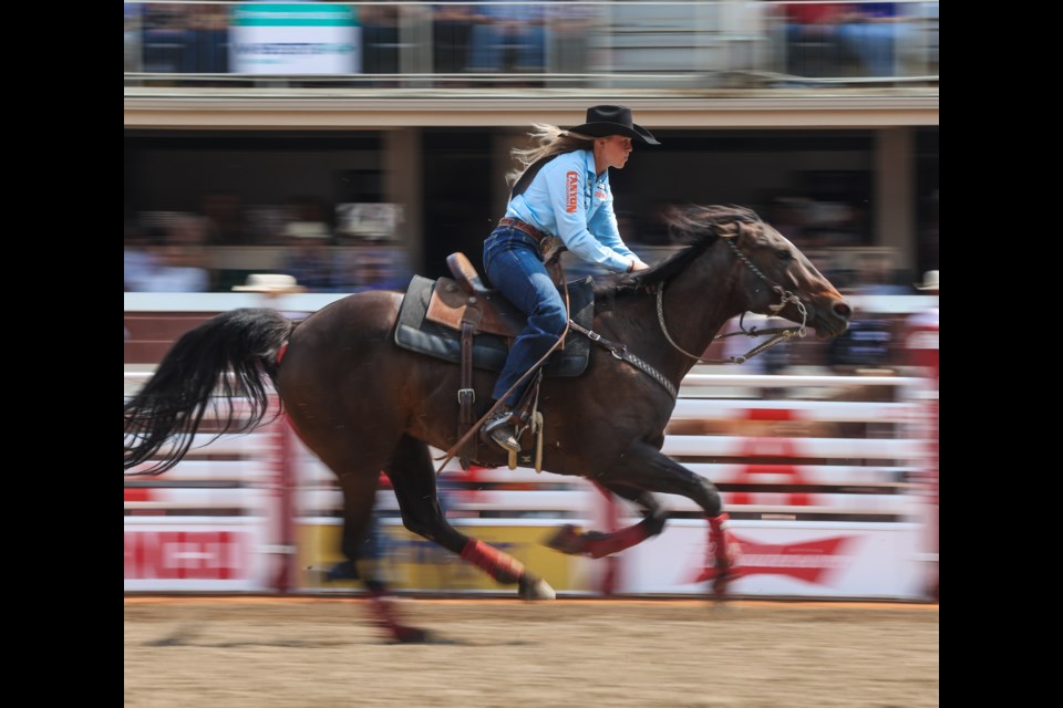 Longview barrel racer Bradi Whiteside speeds for the finish on day one of the Calgary Stampede Rodeo on July 7.