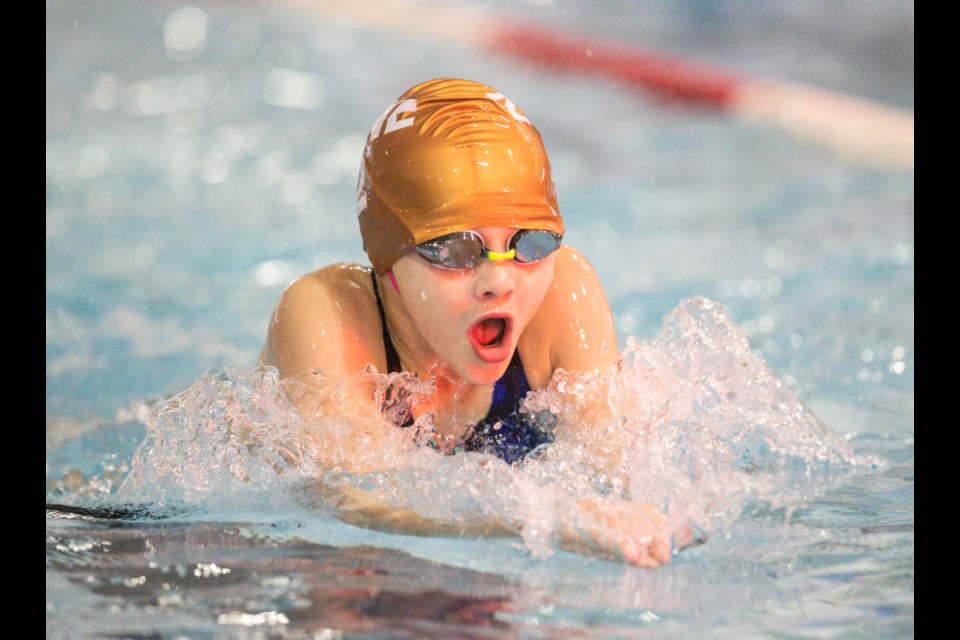Okotoks swimmer Peyton Jones competes in the girls 100m breaststroke at the 2023 Alberta Summer Games at the Riley Minue Pool on July 22.