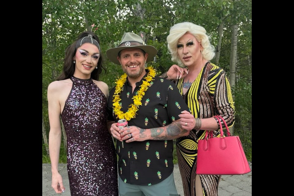 Drag queens Farrah Nuff (right) and Nada Nuff pose with Jared McCollum, with whom Farrah is hosting a drag show at the Rotary Performing Arts Centre on Aug. 19.