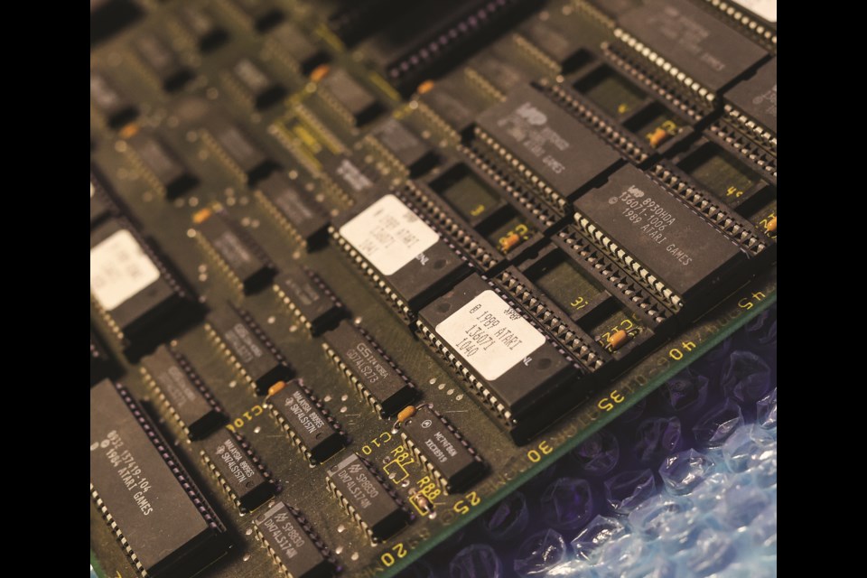 The circuit board for 1989 Atari arcade game 'Cyberball 2072' plugged into a test chassis that Retro Oasis owner Steve Smith built.