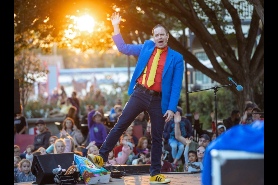 Magician Christopher Cool dances on stage during a trick at the final Thursday Nights at the Plaza show of the season on Aug. 24.