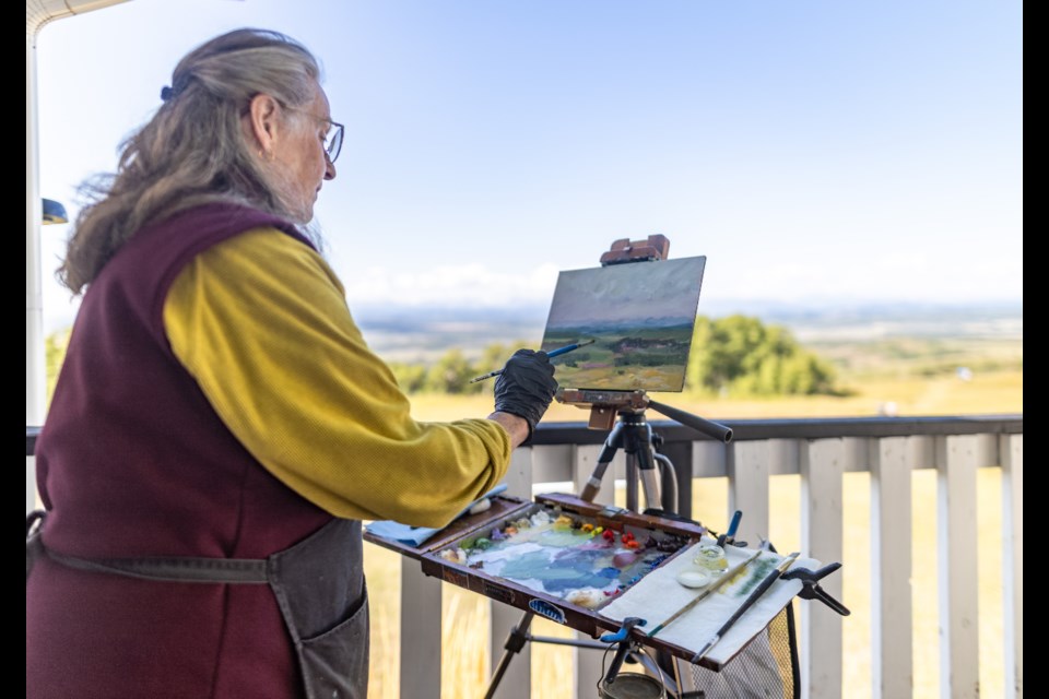 Debra Ward paints during the Leighton Art Centre's Paint the Foothills plein air event on Sept. 9.