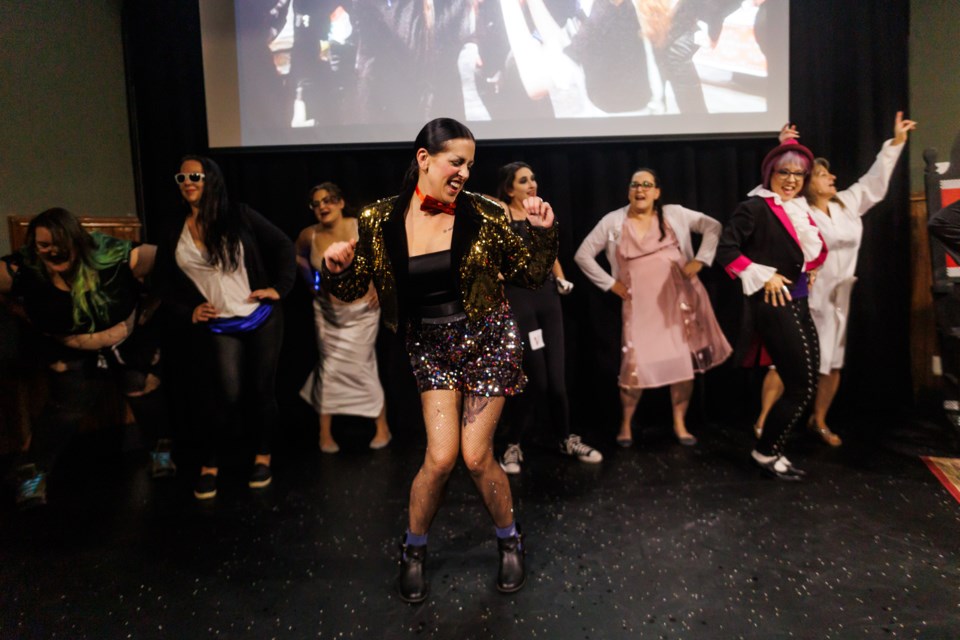 The audience takes to the stage for the 'Time Warp' during a screening of Rocky Horror Picture Show at the Rotary Performing Arts Centre on Oct. 14.