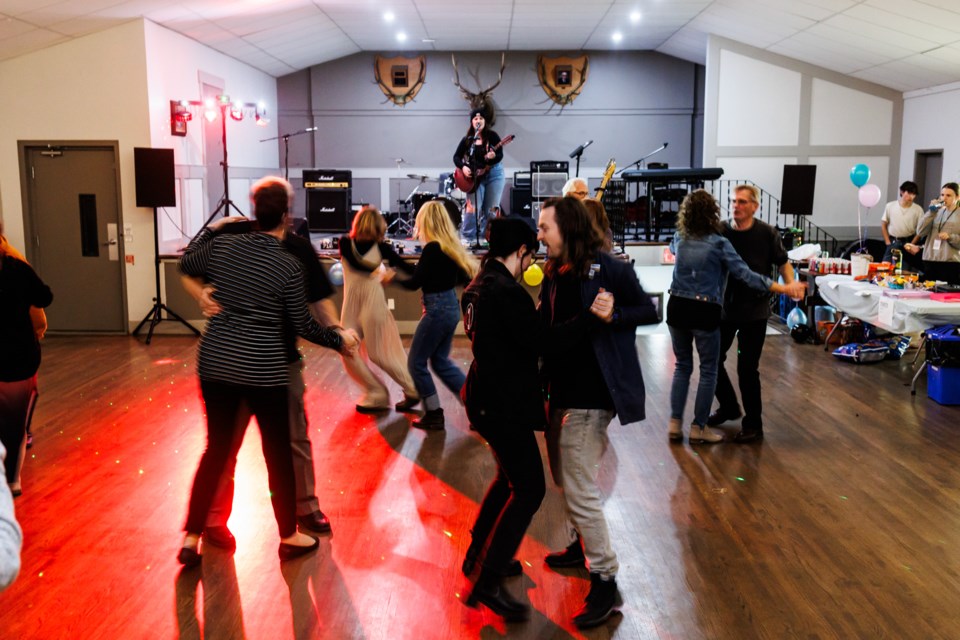 The dance floor comes alive as Michela Sheedy performs during the Fill Kolton's Bucket concert and fundraiser at the Okotoks Elks Hall on Oct. 21.