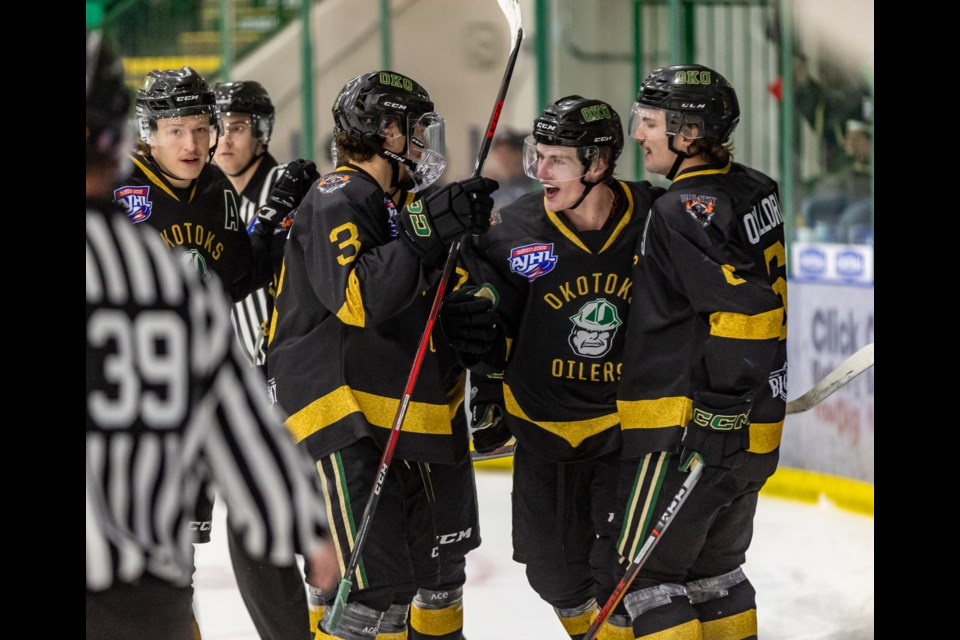 Okotoks Oilers forward Jagger Tapper celebrates his game-tying goal against the Blackfalds Bulldogs in the final minutes of the third period at Okotoks Centennial Arenas on Nov. 18.