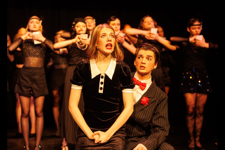 Lawyer Billy Flynn (played by Fletcher Martin) puppets Roxie Hartt (Rachel Graham) in 'We Both Reached for the Gun' in the Alberta High School of Fine Arts' production of 'Chicago: Teen Edition' on Dec. 9.