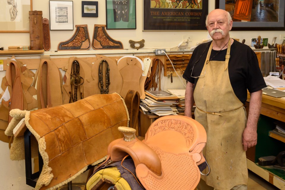Saddlemaker Chuck Stormes at his shop north of MIllarville on Sept. 6. 