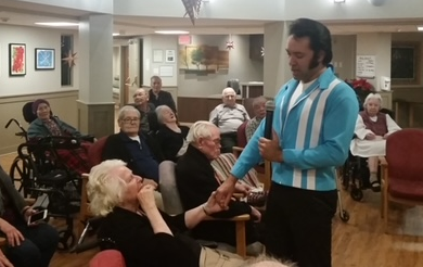 Eli 'Tigerman' Williams performs his Elvis tribute show to an adoring fan.