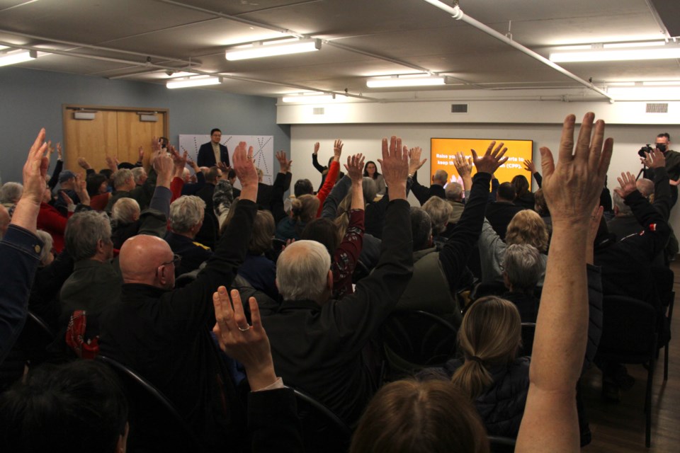 Foothills residents fill the High River Library event room. Attendees spoke their minds, with some in favour of the UCP's proposed pension plan and most against it.