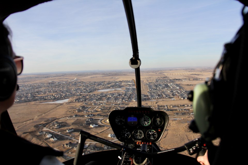 A view of Okotoks from the cockpit of Calgary Helicopter Tours owner Jacki Krsa's helicopter.