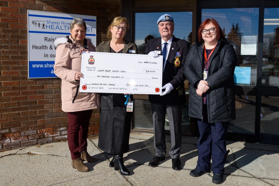 From left to right: Diamond Valley councillor Hazel Martin, site manager Sharon Dowdall, Turner Valley Legion president Paul Barton and Sheep River Health Trust fund development coordinator Christine Oakes during a cheque presentation at the Oilfields General Hospital in Diamond Valley March 27. Funds donated from the Turner Valley Legion will be used for emergency room equipment.
