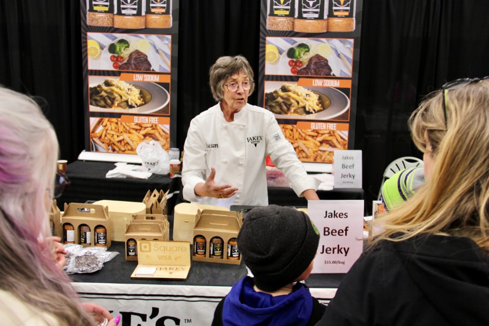 Susan Sandberg, with Jake's Seasoning, hands out free samples of spices and jerky.