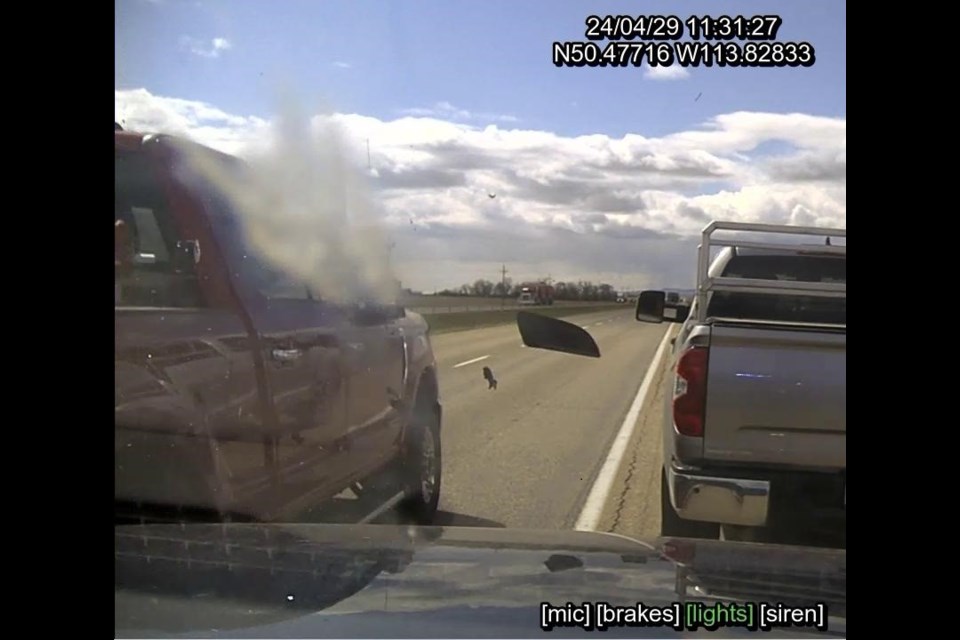 A High River RCMP police cruiser lost its side mirror after a vehicle scraped against it during a traffic stop on April 29.