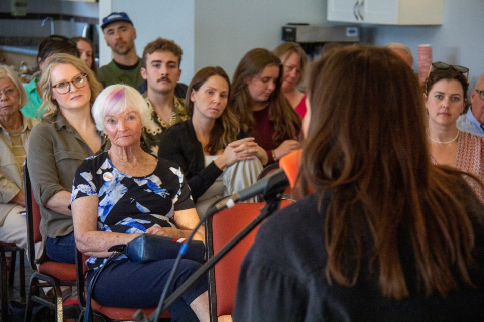 Janet Eremenko, Alberta's Official Opposition critic for mental health and addictions, speaks at a healthcare town hall at Okotoks' Crystal Shores Beach House on Aug. 22.