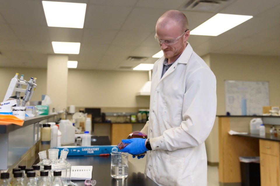 Chemical technician Kaevin Heffernan works in one of 10FOLD Group's labs near Okotoks on May 1.