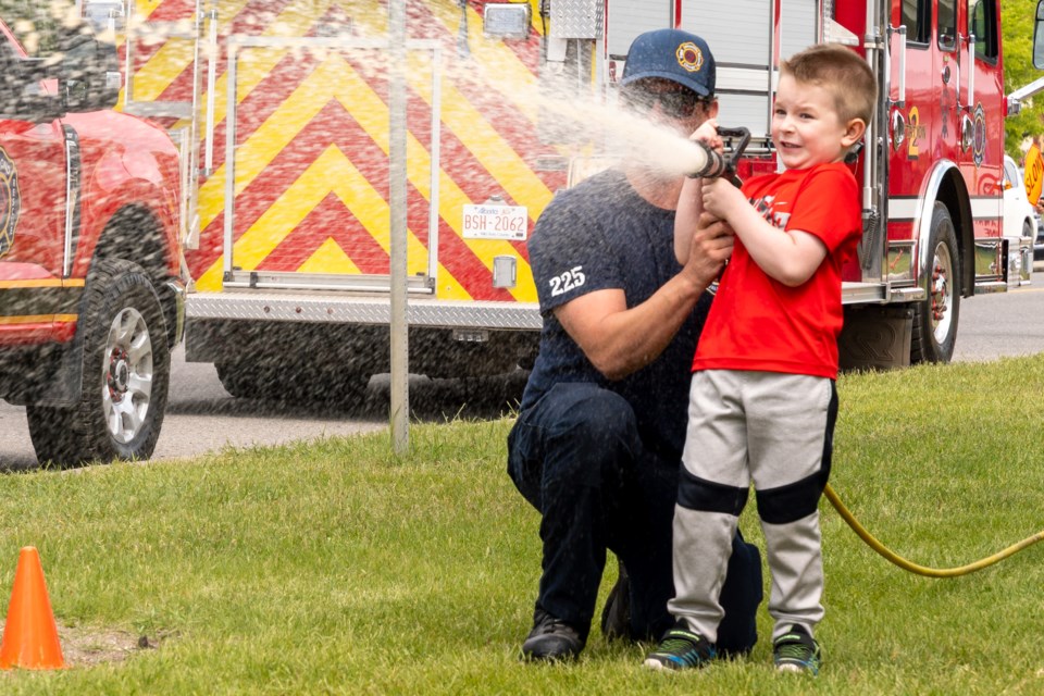 Kids compete at the activity course set up by Diamond Valley Fire Rescue at the Diamond Valley Family Festival on June 7.