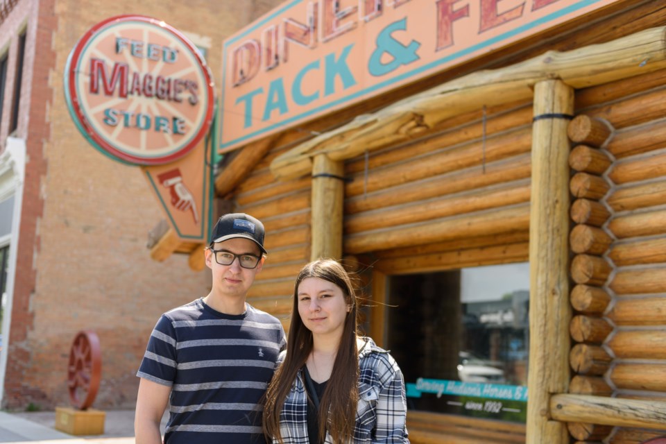 Calgarians Kirill Shpak, left, and Jocelyn Neumeier visit the Maggie's Diner set from the show "Heartland" in High River on June 7.