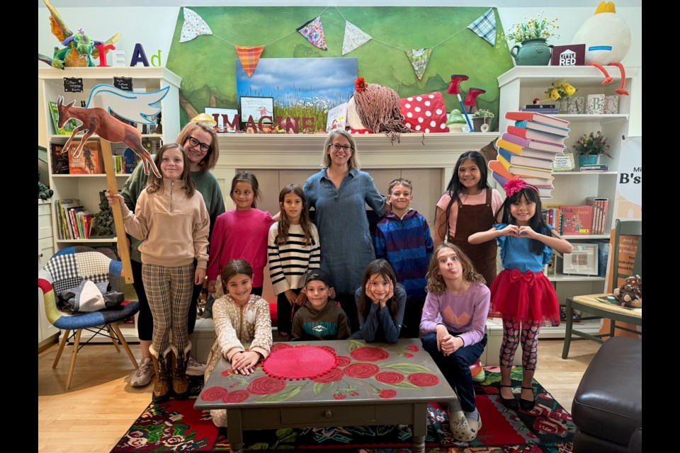 Jennifer Stables, middle, with the young artists of Seeding Readers.