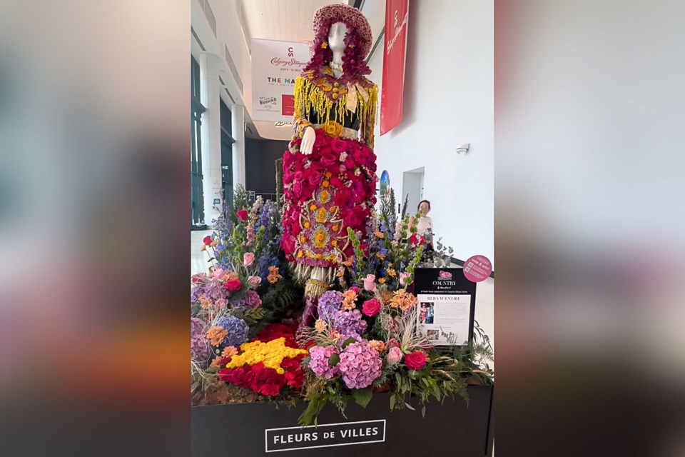 A life-size floral arrangement inspired by Reba McEntire won an award for Okotoks florist Boy o Boy Flowers by Nikolle during an exhibition at the Calgary Stampede.