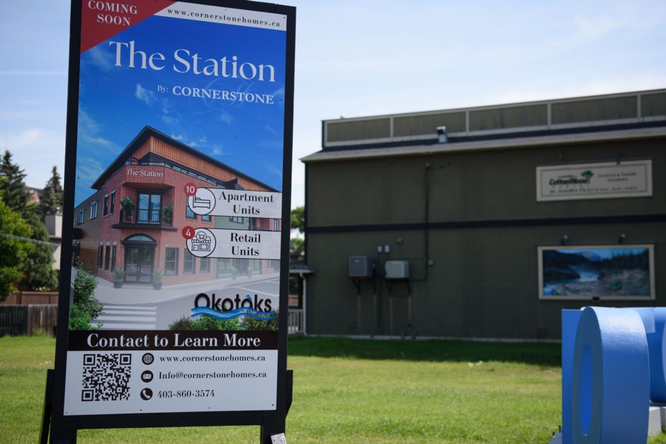 An empty lot at the corner of McRae Street and Clark Avenue in Okotoks on July 16. Developers plan to construct an apartment building with retail space at the site.