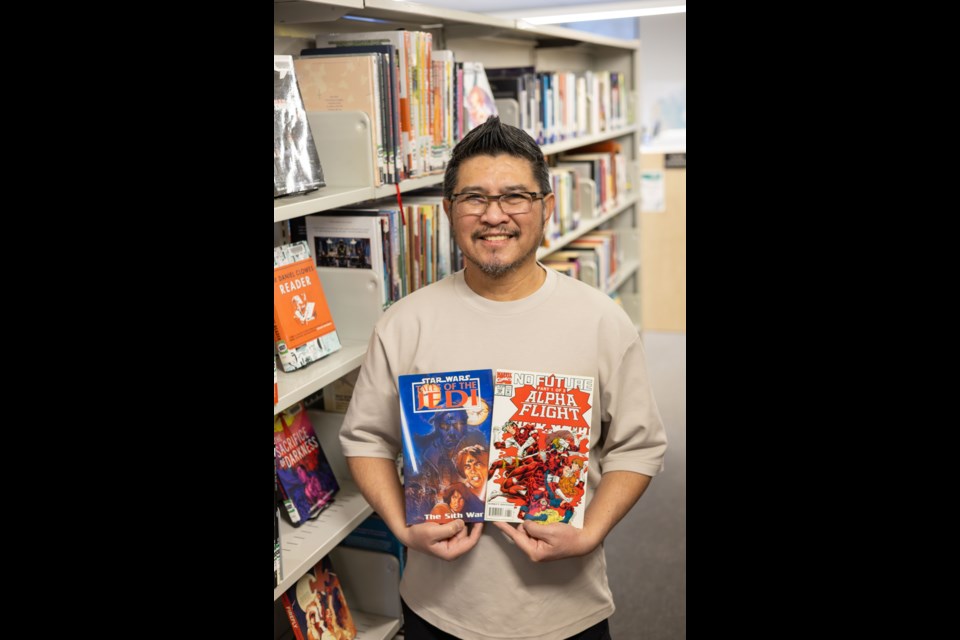 Dario Carrasco Jr. shows off some of his work on Feb. 19.