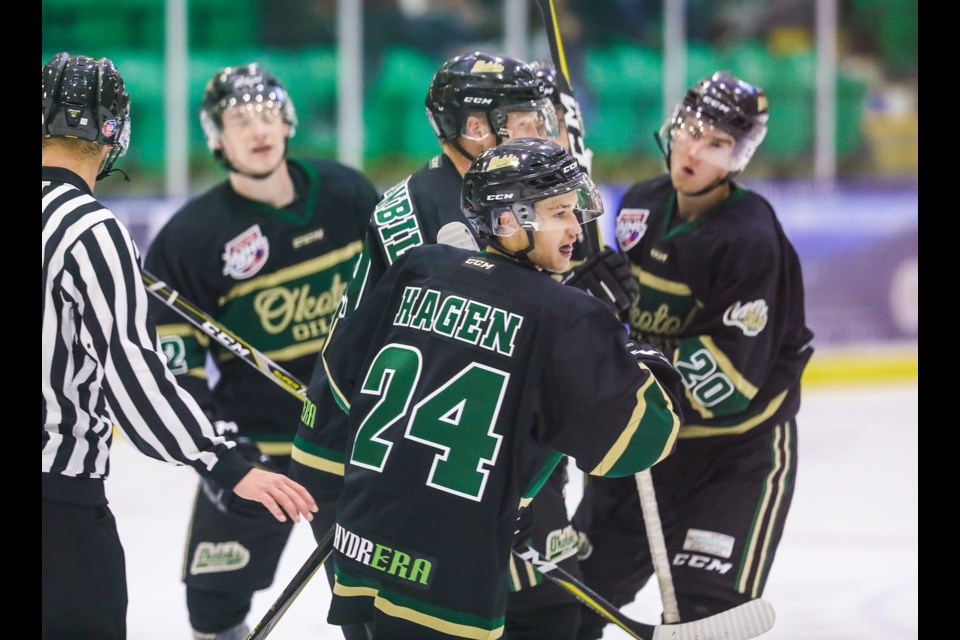 Okotoks Oilers forward Michael Hagen celebrates his goal on the Camrose Kodiaks with the team during their home opener at Pason Centennial Arena on Sept. 20. (BRENT CALVER/Western Wheel)