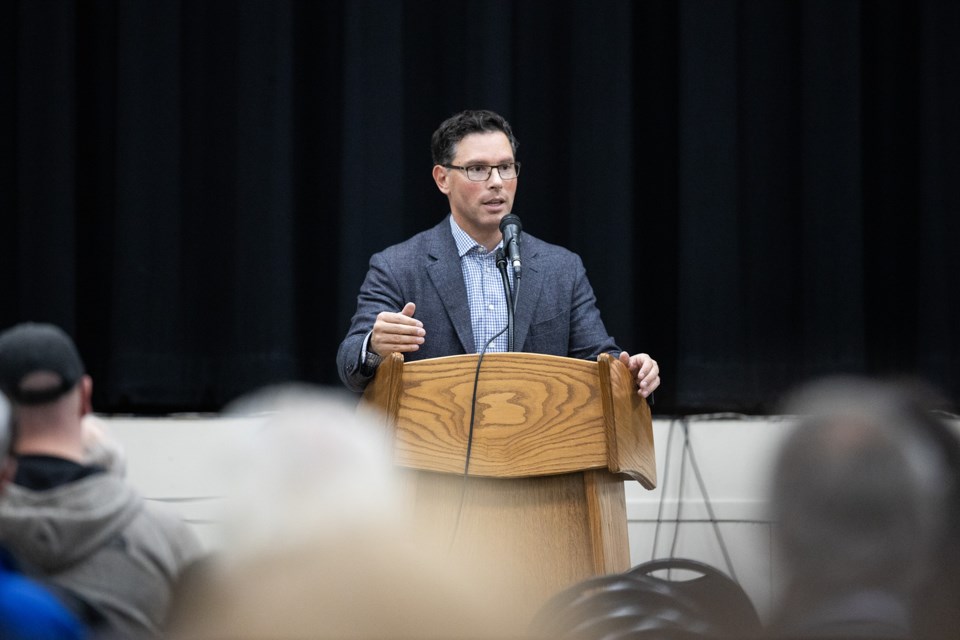 Alberta Justice Minister Doug Schweitzer speaks at a rural crime meeting at the Foothills Centennial Centre in Okotoks Oct. 1. Schweitzer recently toured Alberta to hear from residents about their concerns with rural crime. Photo by Brent Calver/Great West Newspapers