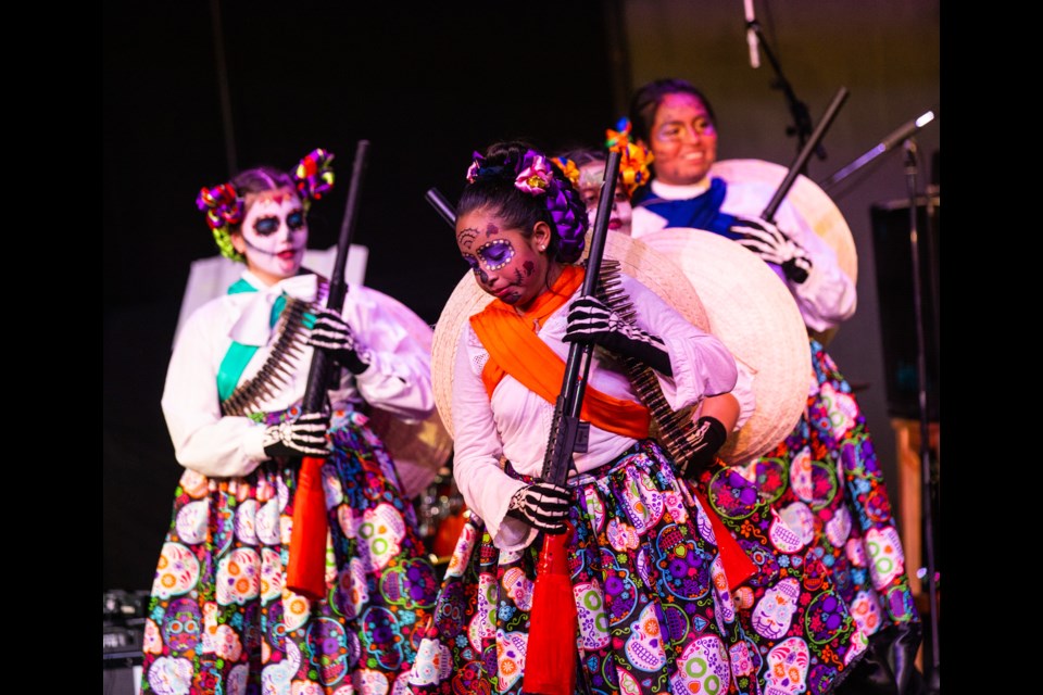 Dancers from the IRERI-Mexican, Latino, and Cross Cultural Society perform in a Dia de los Muertos (Day of the Dead) event at the Rotary Performing Arts Centre on Nov. 2. (BRENT CALVER/Western Wheel)
