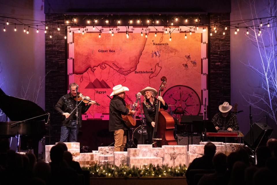 Over the Moon performs Christmas for Cowboys during the Okotoks Food Bank Christmas Concert at the Evangelical Free Church on Dec. 11. (BRENT CALVER/Western Wheel)