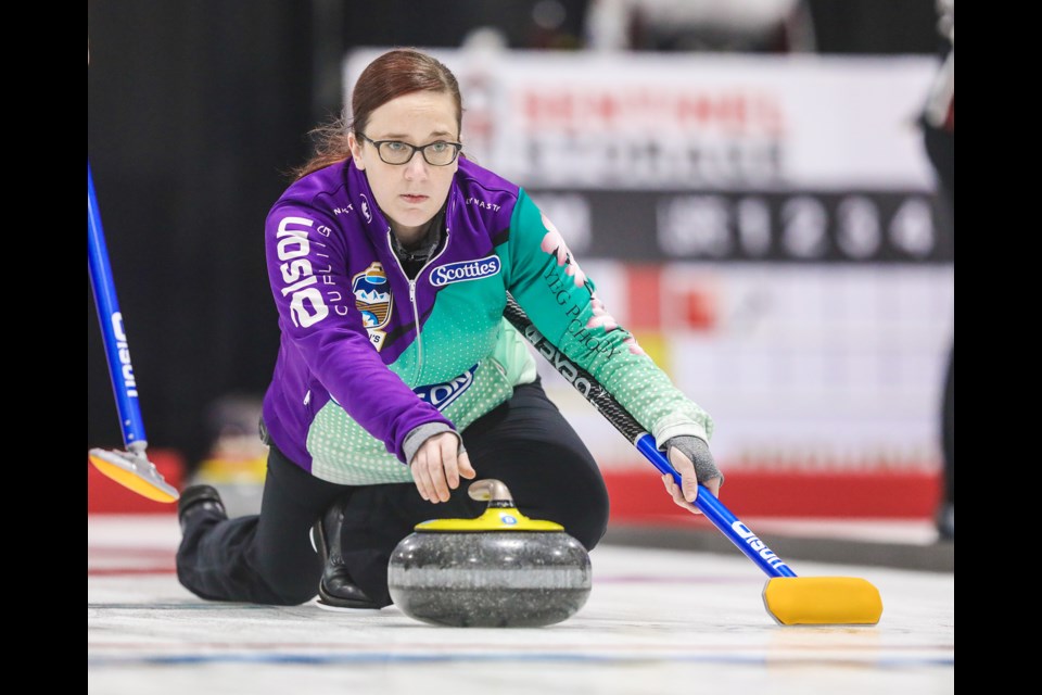 Team Kaufman skip Nicky Kaufman throws during draw 5 of the 2020 Alberta Scotties at Murray Arena in Okotoks on Jan. 24. (Brent Calver/Western Wheel)