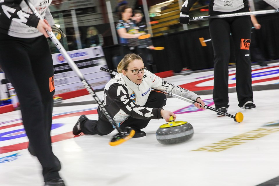 Team Vaughan skip Jodi Vaughan throws during draw 6 of the 2020 Alberta Scotties at Murray Arena in Okotoks on Jan. 24. (Brent Calver/Western Wheel)