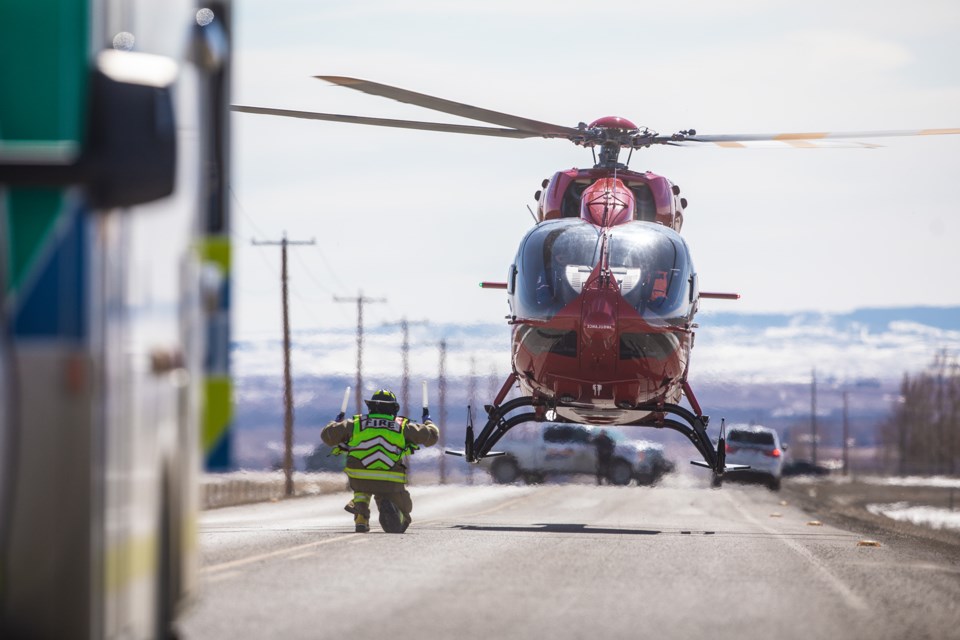 STARS Air Ambulance lands at a two-vehicle collision on Highway 783 and 434 Ave. March 27. (Brent Calver/Western Wheel)