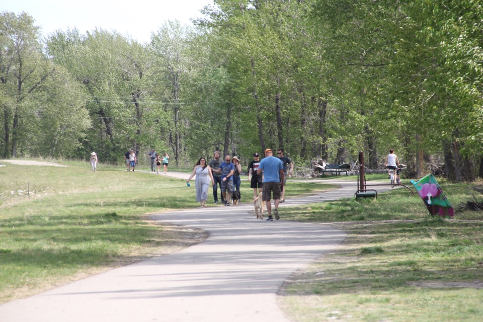 Okotoks residents get out to enjoy the warm weather in Sheep River Park on May 30. (Krista Conrad/Western Wheel)