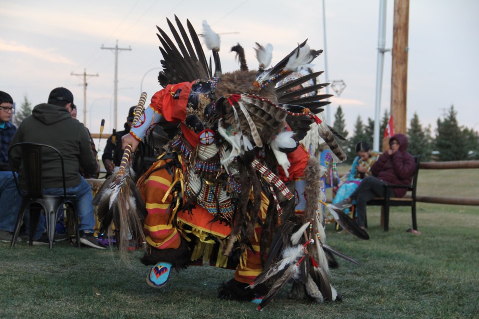Dallas Powderface performs the Men's Traditional Dance, which tells stories of battle and hunting, both of which were important to the Sioux Nation and Stoney Nakoda people, at Hard Knox Brewery in Black Diamond on Sept. 25. The event kicked off Harvest Festival, a community event in support of the Boys and Girls Club of the Foothills. (Krista Conrad/Western Wheel)