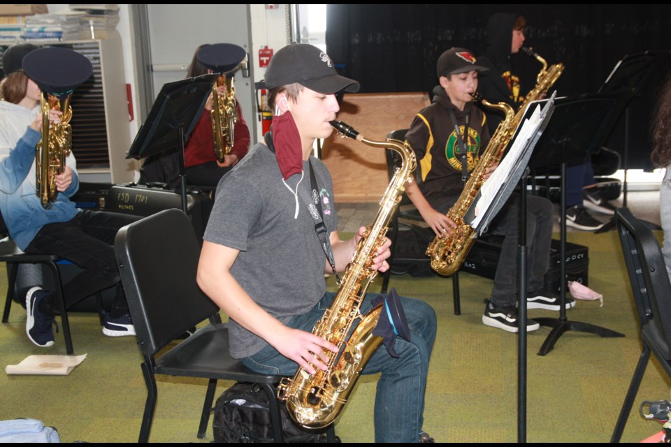 Dusan Ivkovic, plays his tenor saxophone during a Grade 10 Concert band class at Foothills Composite High School on Oct. 22. (Bruce Campbell/Western Wheel)