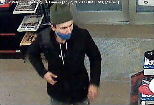 High River RCMP are looking to identify two suspects in relation to  vehicle and garage thefts in the area on Nov. 2. They were caught on camera using a credit card at the Aldersyde Petro-Can believed to have been stolen from one of the vehicles. (Photo submitted/High River RCMP)